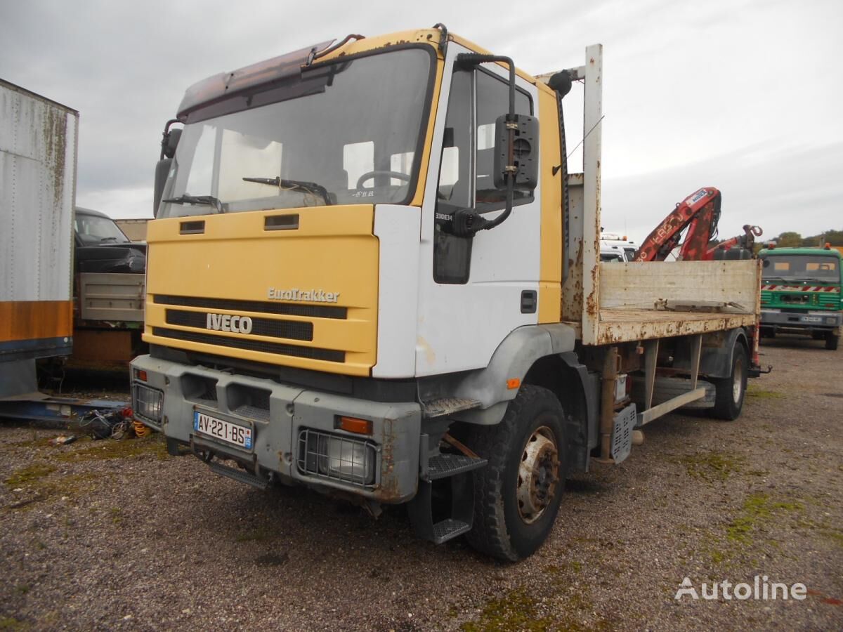 IVECO Eurotrakker 330E34 flatbed truck