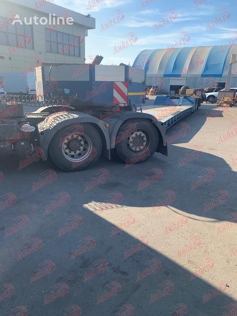 MAN TGX 26.440 truck tractor + low bed semi-trailer